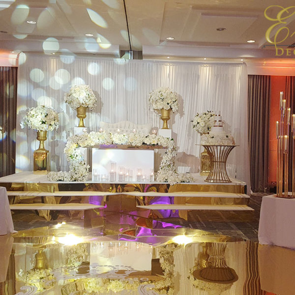 gold backdrop stage wedding